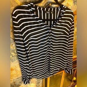 Women’s size small black and white striped shirt by Ana.